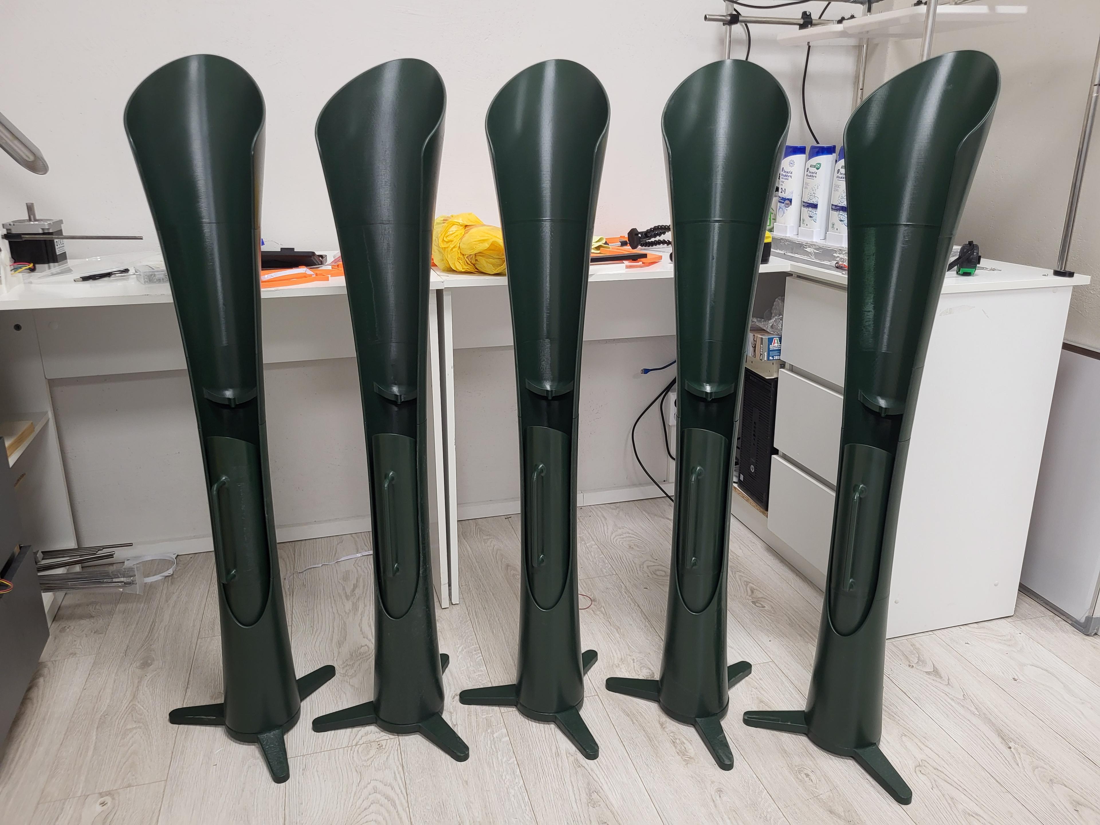 Five finished RainBloom units on their weighted tripod bases